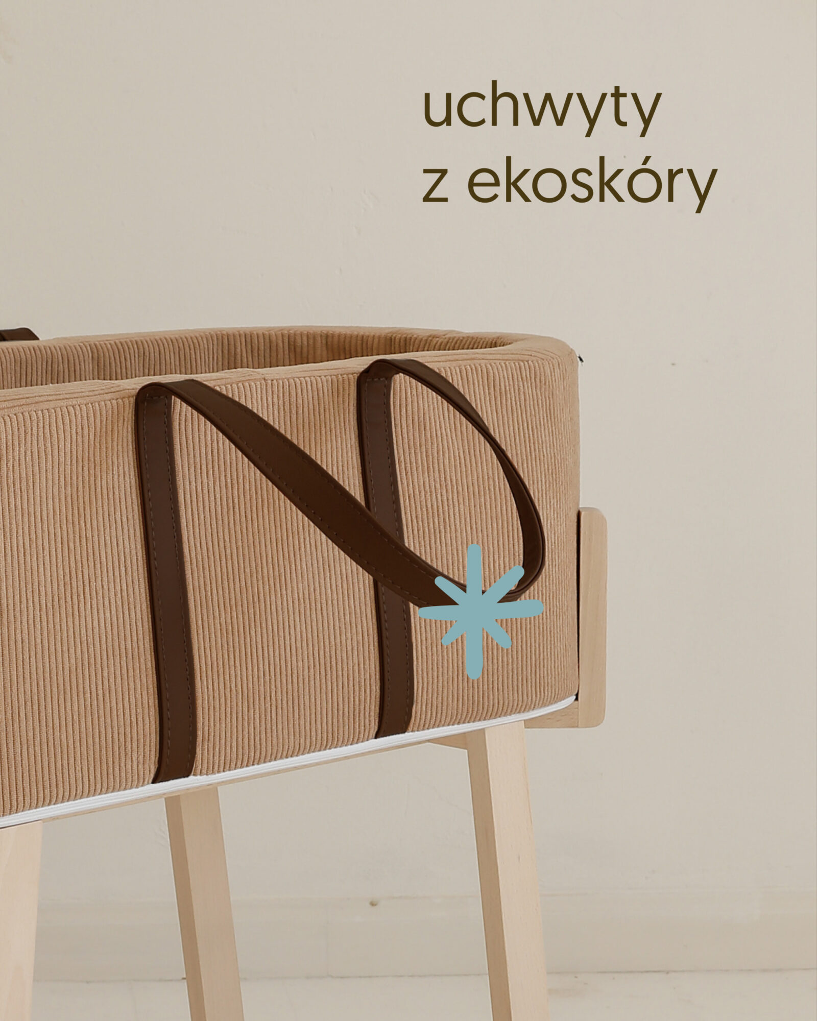 Zbliżenie uchwytów Kosza Mojżesza z ekoskóry.