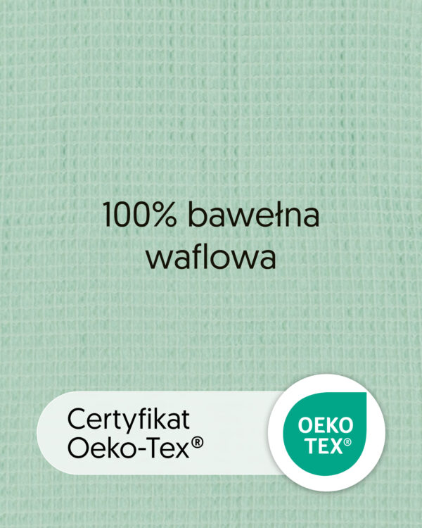 Zbliżenie bawełny waflowej w kolorze miętowym z tekstem „100% bawełna waflowa” i oznaczeniem OEKO-TEX.